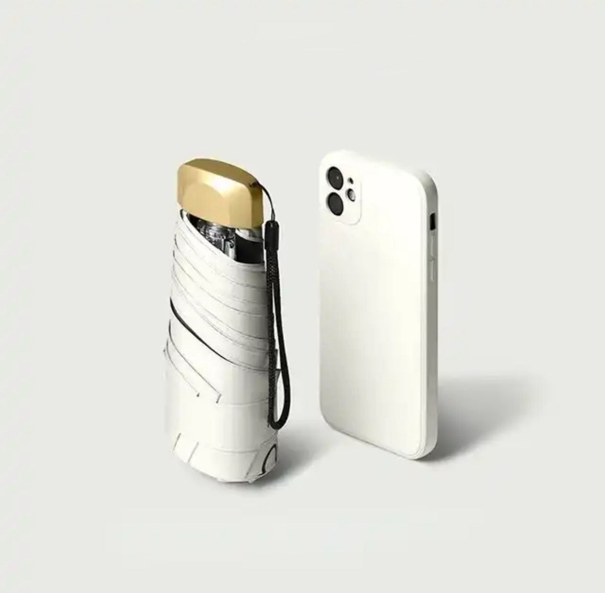 Mini Knirps – Kompakt paraply for reise og hverdagsbruk