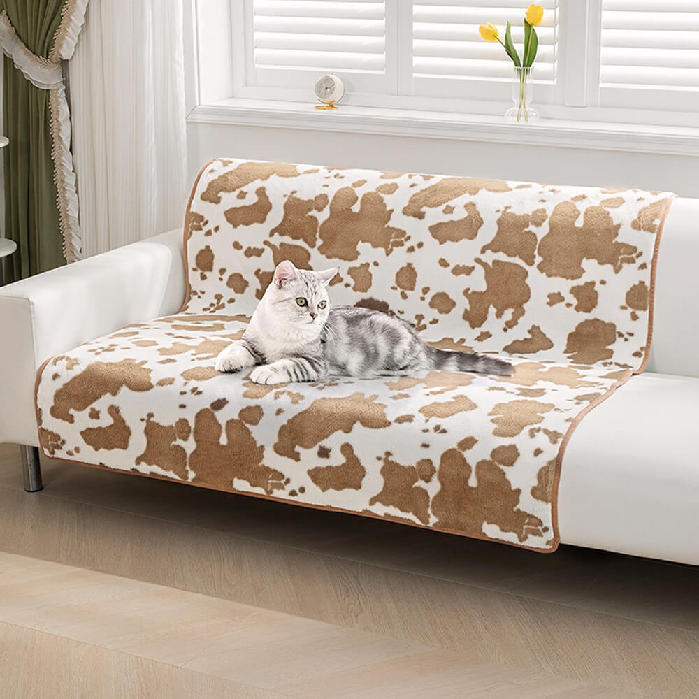 CozyCow pled for kjæledyr – Myk og stilig pled med kumønster