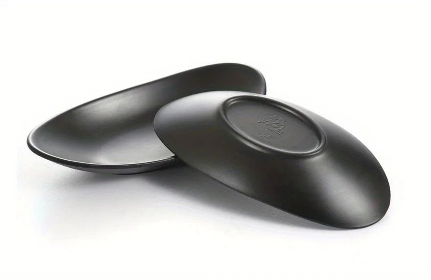 GleamNest – Oval Smykkeskål i Sort Keramikk med Stil og Struktur