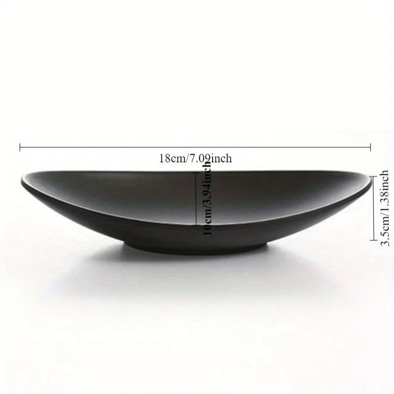 GleamNest – Oval Smykkeskål i Sort Keramikk med Stil og Struktur